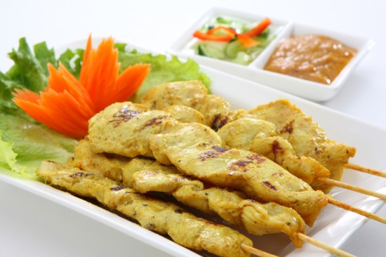 Chicken satay with peanut dipping sauce and cucumber relish