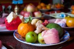 Chinese New Year Offering of Steamed Cakes and Fruits