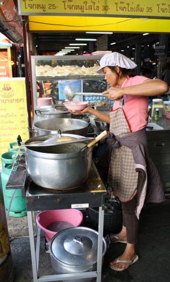 Serving a bowl of jok