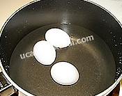 Hard boil the eggs