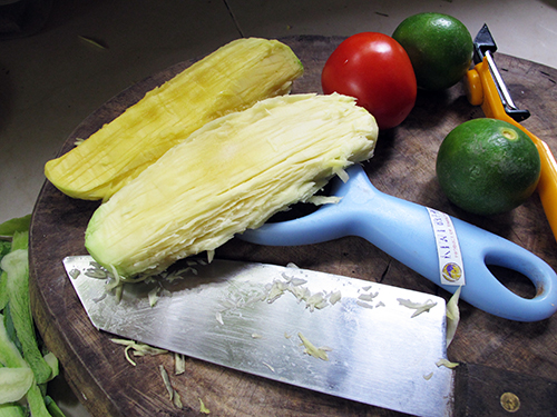 Shredding the Mango for Thai Mango Salad
